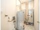 Well-maintained utility room with a modern water heater and HVAC system at 1105 Deer Creek Dr, Anderson, IN 46011
