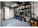Organized basement storage area with shelving units and durable flooring at 114 E 44Th St, Indianapolis, IN 46205