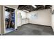 Bright basement featuring utility sink, cabinets, and accessible stairs at 114 E 44Th St, Indianapolis, IN 46205