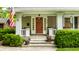 Cozy front porch with a seating area, perfect for relaxing at 114 E 44Th St, Indianapolis, IN 46205