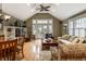 Spacious living room with vaulted ceilings, a cozy seating area, and natural light at 114 E 44Th St, Indianapolis, IN 46205