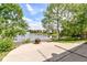 Inviting backyard with a fire pit and a view of the lake, perfect for outdoor gatherings at 11816 Wapiti Way, Noblesville, IN 46060