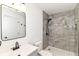 Modern bathroom with a gray vanity and a tiled walk-in shower at 11816 Wapiti Way, Noblesville, IN 46060