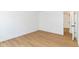 Spacious bedroom featuring light wood flooring and an open doorway at 11816 Wapiti Way, Noblesville, IN 46060