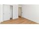 Bedroom features a closet with sliding doors, with wood-look flooring at 11816 Wapiti Way, Noblesville, IN 46060