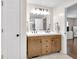 Bathroom boasts stylish double vanity with ample storage and modern finishes at 1311 E Michigan St, Indianapolis, IN 46202