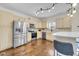 Bright kitchen featuring stainless steel appliances, ample cabinetry, and a functional layout at 1311 E Michigan St, Indianapolis, IN 46202