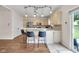 Modern kitchen with a large island, sleek appliances, and ample cabinet space at 1311 E Michigan St, Indianapolis, IN 46202