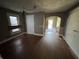 Dining room with hardwood floors and gray walls, ready for transformation with new flooring and modern touches at 1314 Laurel St, Indianapolis, IN 46203
