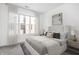 Cozy bedroom with soft lighting, a comfortable bed, and a large window at 1322 Colere Pl, Indianapolis, IN 46203