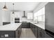 Well-appointed kitchen with white countertops, gray cabinets, and stainless steel appliances at 1322 Colere Pl, Indianapolis, IN 46203