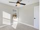 Bright bedroom featuring natural light from the window and neutral walls at 1429 Deloss St, Indianapolis, IN 46201