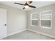 Bright bedroom featuring carpet floor and natural light from the window at 1429 Deloss St, Indianapolis, IN 46201
