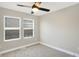 Bright bedroom featuring carpet floor and natural light from the window at 1429 Deloss St, Indianapolis, IN 46201
