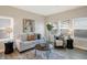 Bright living room filled with natural light features a comfortable sofa and stylish decor at 1429 Deloss St, Indianapolis, IN 46201