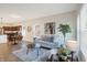 Open-concept living room flows into the kitchen and dining area, perfect for entertaining and relaxation at 1429 Deloss St, Indianapolis, IN 46201