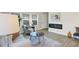 Comfortable living room with modern decor, large windows, and a cozy seating area at 1429 Deloss St, Indianapolis, IN 46201