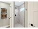 Bathroom showcasing a sleek, tiled shower with matte black fixtures and natural light at 1429 Deloss St, Indianapolis, IN 46201