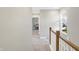 Upstairs hallway with view of living area through a doorway at 1429 Deloss St, Indianapolis, IN 46201