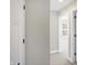 Upstairs hallway with white doors and black hardware at 1429 Deloss St, Indianapolis, IN 46201