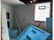 Bathroom with new shower, offering potential for a modern and updated space at 155 S Elder Ave, Indianapolis, IN 46222