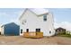 Spacious backyard featuring a wooden deck and ample space for outdoor activities and relaxation at 1577 Vision Ct, Danville, IN 46122
