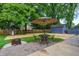 Inviting backyard patio with seating, perfect for outdoor relaxation and entertainment, and ample green space at 1604 Stacy Lynn Dr, Indianapolis, IN 46231