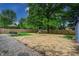 Expansive backyard features a playset, outdoor seating, and ample space for various outdoor activities at 1604 Stacy Lynn Dr, Indianapolis, IN 46231