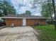 Back of house with a concrete patio and well maintained central air conditioning unit at 1614 Dayton Ave, Indianapolis, IN 46203