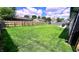 Large, fully fenced backyard provides privacy and ample space for outdoor activities at 170 Briar Hill Dr, Whiteland, IN 46184