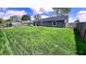 Expansive fenced backyard with lush green grass offers plenty of room for recreation at 170 Briar Hill Dr, Whiteland, IN 46184
