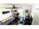 Relaxing bedroom with large closet, mounted TV, futon, workout equipment and well placed lighting at 170 Briar Hill Dr, Whiteland, IN 46184