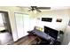 Relaxing bedroom with large closet, mounted TV, futon, workout equipment and well placed lighting at 170 Briar Hill Dr, Whiteland, IN 46184