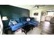 Cozy living room with a comfortable blue sectional sofa and stylish decor at 170 Briar Hill Dr, Whiteland, IN 46184