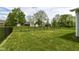Spacious fenced backyard with lush green lawn, perfect for outdoor activities and relaxation at 19442 Honeylocust Glen, Noblesville, IN 46062