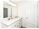 Bright bathroom featuring double sinks, modern fixtures, and a granite countertop, offering style and functionality at 19442 Honeylocust Glen, Noblesville, IN 46062