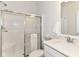 Modern bathroom with a glass-enclosed shower and sleek vanity, designed for relaxation and convenience at 19442 Honeylocust Glen, Noblesville, IN 46062