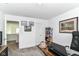 Bright office space features carpet, overhead lighting, and a large desk perfect for working from home at 19442 Honeylocust Glen, Noblesville, IN 46062