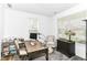 Bright home office with a wooden desk, comfortable chair, and window for natural light at 19442 Honeylocust Glen, Noblesville, IN 46062