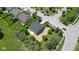 Aerial view shows the house surrounded by trees and other homes in the neighborhood at 19570 Forsythe Dr, Noblesville, IN 46060