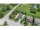 Overhead view of a two-story house on a corner lot with adjacent green space at 19570 Forsythe Dr, Noblesville, IN 46060