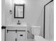 The bathroom features a modern vanity, framed mirror, toilet, and glass-enclosed shower at 19570 Forsythe Dr, Noblesville, IN 46060
