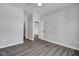 Spacious bedroom with wood-look floors, featuring a closet and ample room for furniture at 19570 Forsythe Dr, Noblesville, IN 46060