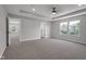 A spacious bedroom features an adjacent bonus room and a view of the outdoors at 19570 Forsythe Dr, Noblesville, IN 46060