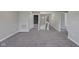 Bonus room with carpet flooring and views of the staircase at 19570 Forsythe Dr, Noblesville, IN 46060