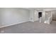 Spacious bonus room with neutral carpet and ample natural light at 19570 Forsythe Dr, Noblesville, IN 46060