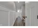 Inviting hallway with custom trim work and bench seating at 19570 Forsythe Dr, Noblesville, IN 46060
