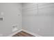 Laundry room featuring wire shelving unit and utility hookups at 19570 Forsythe Dr, Noblesville, IN 46060