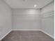 Spacious walk-in closet with wall-to-wall shelving, neutral walls, and soft carpeting at 19570 Forsythe Dr, Noblesville, IN 46060