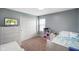 Bright bedroom with blue walls, and white accents at 204 Oakview Dr, Mooresville, IN 46158